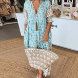 MANA | MIDILANGE CHIQUE FLORALEN JURK MET V-HALS