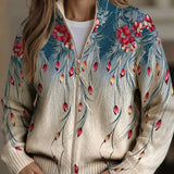 Saskia | Cardigan met pauwenveren- en bloemenprint